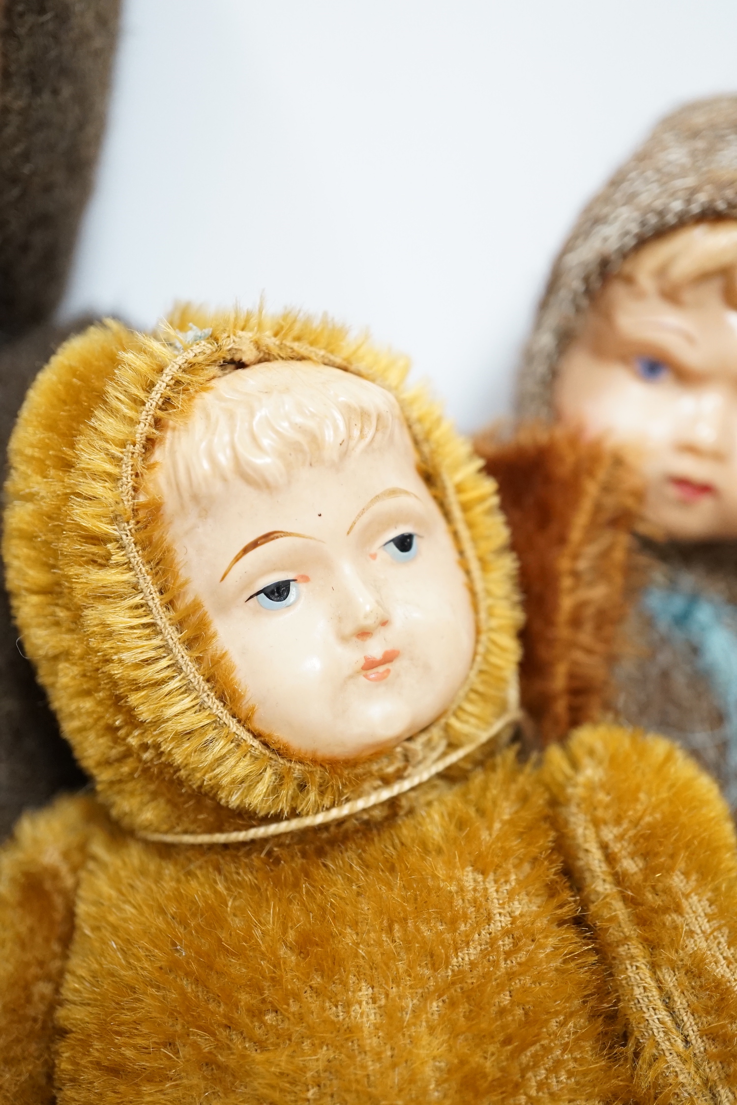 Four Teddy dolls with celluloid faces, c.1990